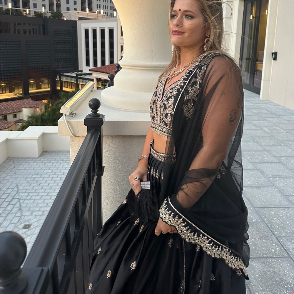 Black and gold lehenga